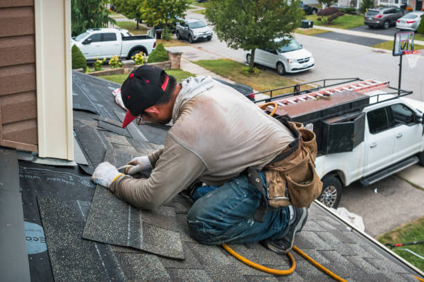 Professional Roofing technician working in Garrett, WA